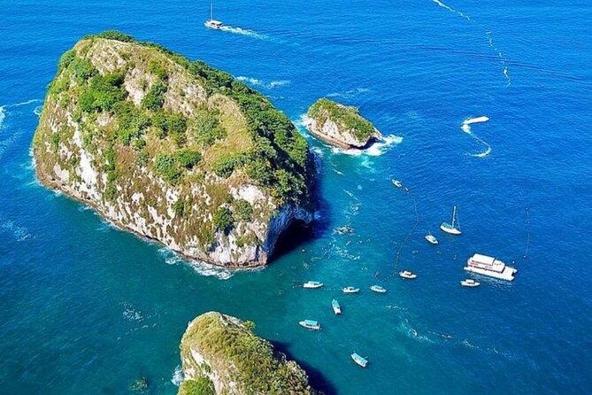 Boat and Snorkel Tour to 5 Islands of Los Arcos - In-water reality check: rough water, comfort, and phone safety