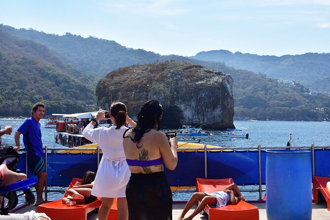 Catamaran Tour to the Arches, Playa las Animas, Snorkeling and more - Return Cruise Fun: Sunset Views, Games, and Crew Energy
