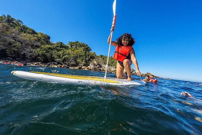Catamaran Yelapa Beach Tour with Snorkeling, Food and Open Bar - Stop 1: Puerto Magico, boarding the catamaran