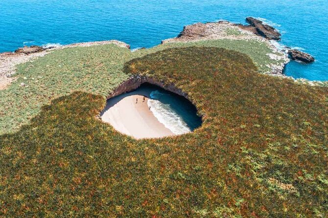 Full Day Tour Isla Marietas with Meals and Open Bar - Isla Marietas highlights: the hidden beach (La Playa del Amor) and access limits