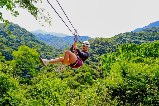 Full Zip Line Tour + Mules + Jorullo Bridge - Entering the Canopy River area, then heading out by open transport