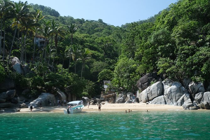 Hidden Beach Snorkeling Adventure - The return beach stop: coconut drinks and a hidden beach break