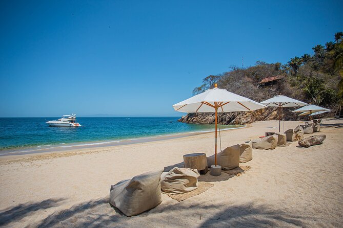 Majahuitas All inclusive Beach Day - The Beach Club Setup: Balinese Beds and Giant Poufs Are the Point