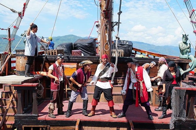 Pirate Ship by Day - Island time: snorkeling, kayaking, banana ride, and beach games