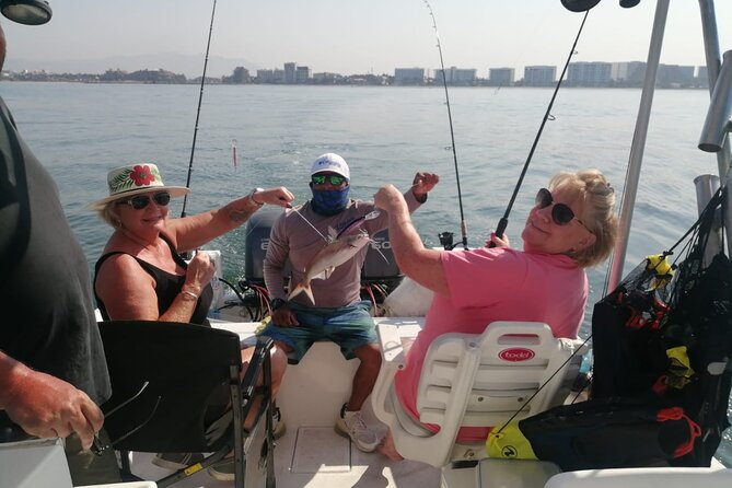 Private Inshore Fishing Adventure in Puerto Vallarta with Snacks - Captain Fernando and his deck hand, what the private style feels like