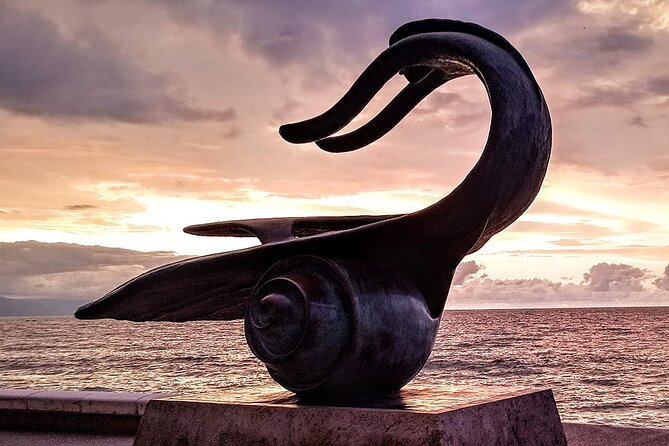 Puerto Vallarta Historical El Centro: A Self-Guided Audio Tour - Faro Del Malecon and the sculpture stretch: 30 pieces of public art