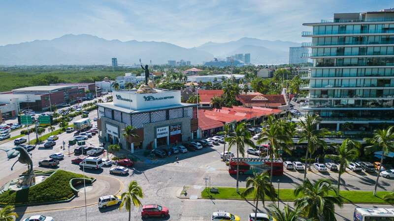 Puerto Vallarta: Hop-On-Hop-Off City Bus Tour - Audio guide: bilingual history through headphones