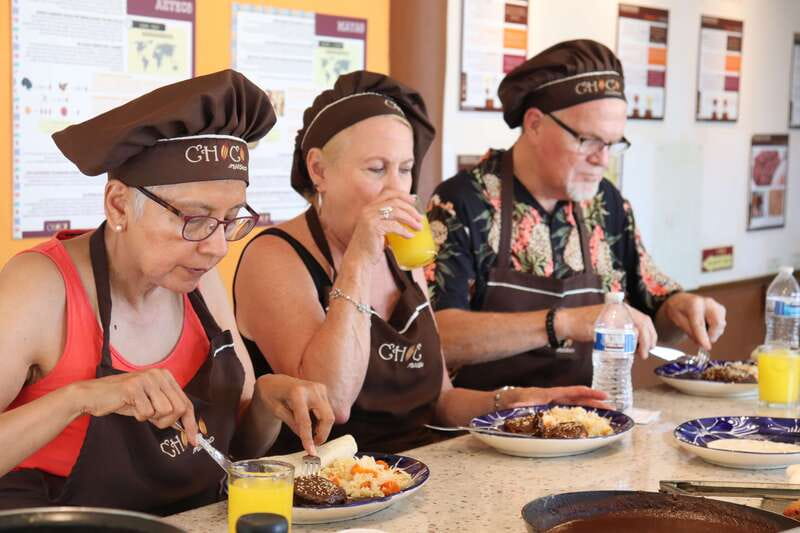 Puerto Vallarta: Mole Poblano Workshop - The meal after you cook: mole with rice and chicken, plus plant-based options